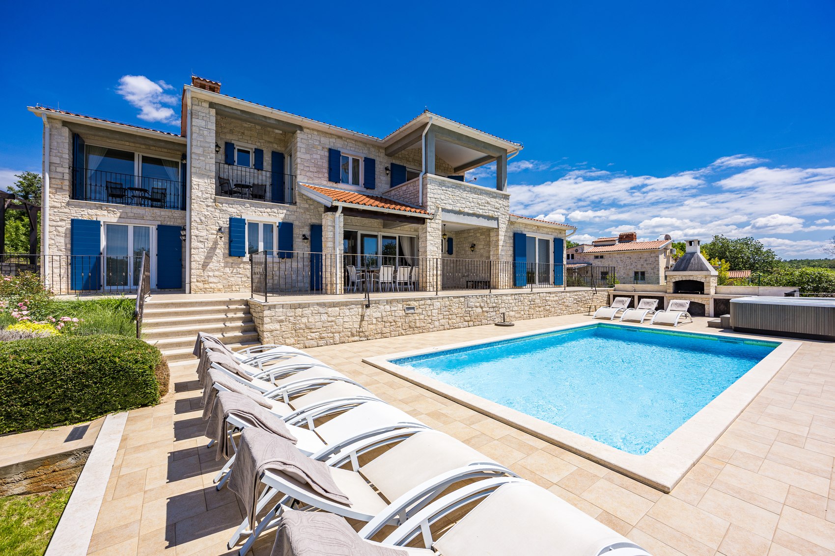 Private heated pool, garden and wellness area at Villa Babudri